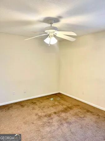 a view of a big room with wooden floor