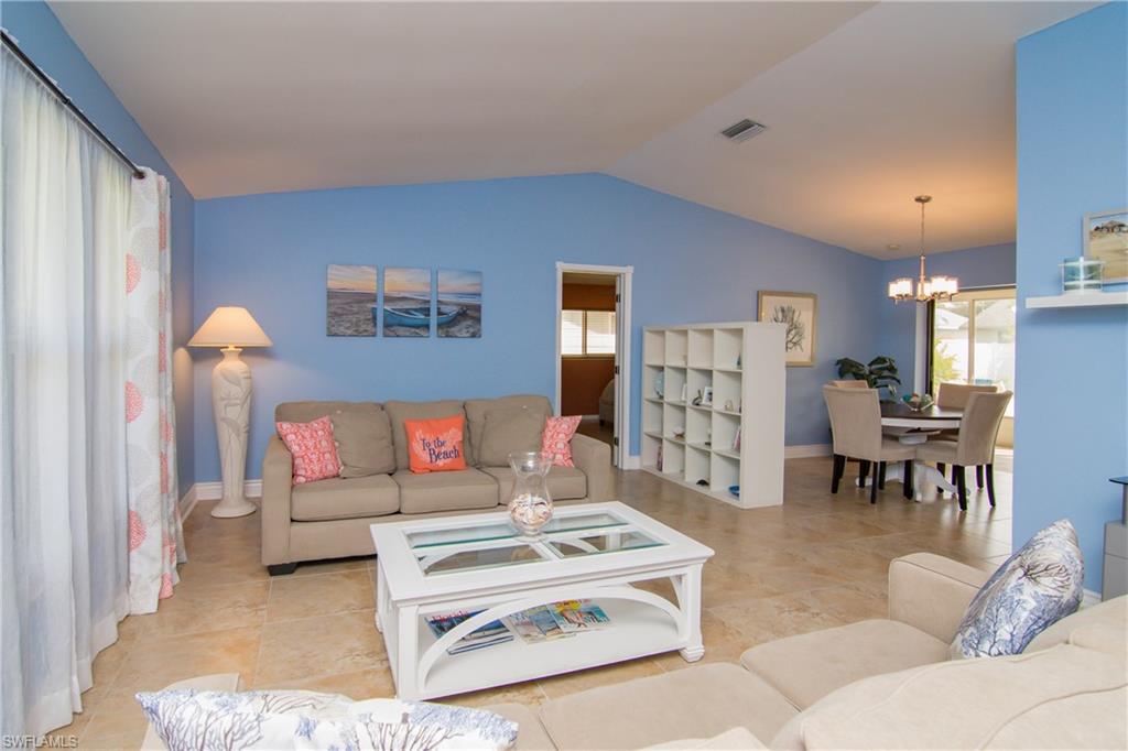 17453 Lebanon Road Fort Myers, FL 33967 - Photo 3 of 29 a living room with furniture and a table