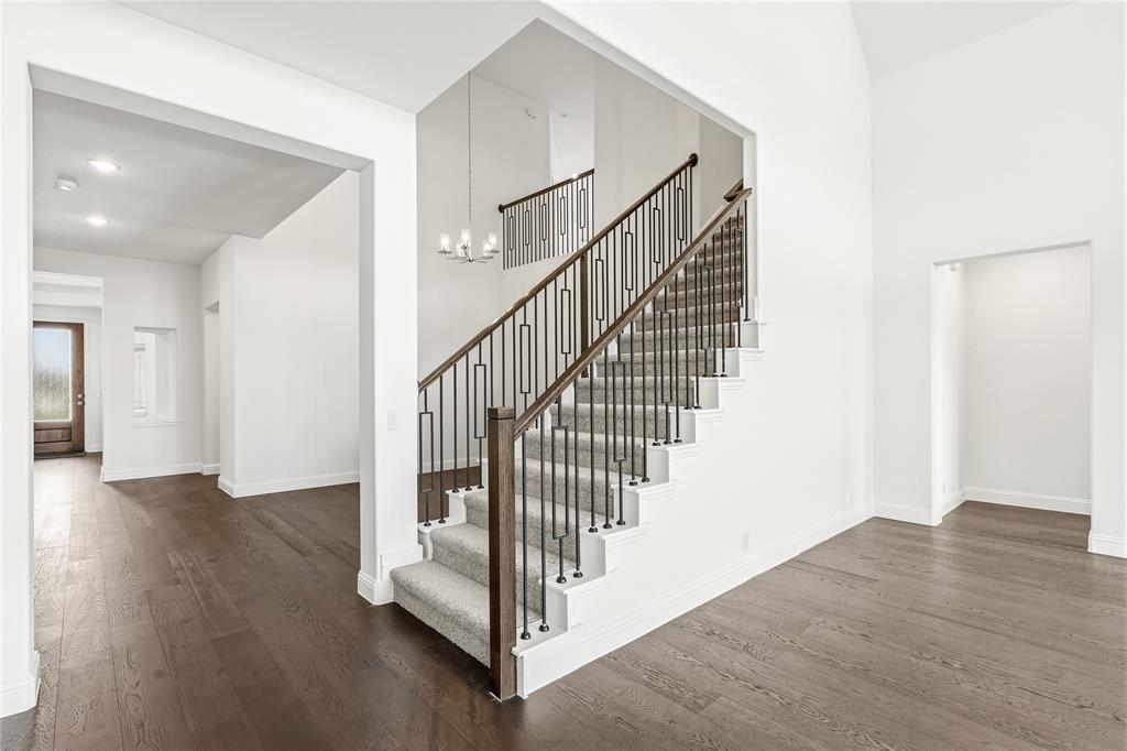 1145 Hitching Post Way Oak Point, TX 75068 - Photo 28 of 39 a view of entryway with wooden floor