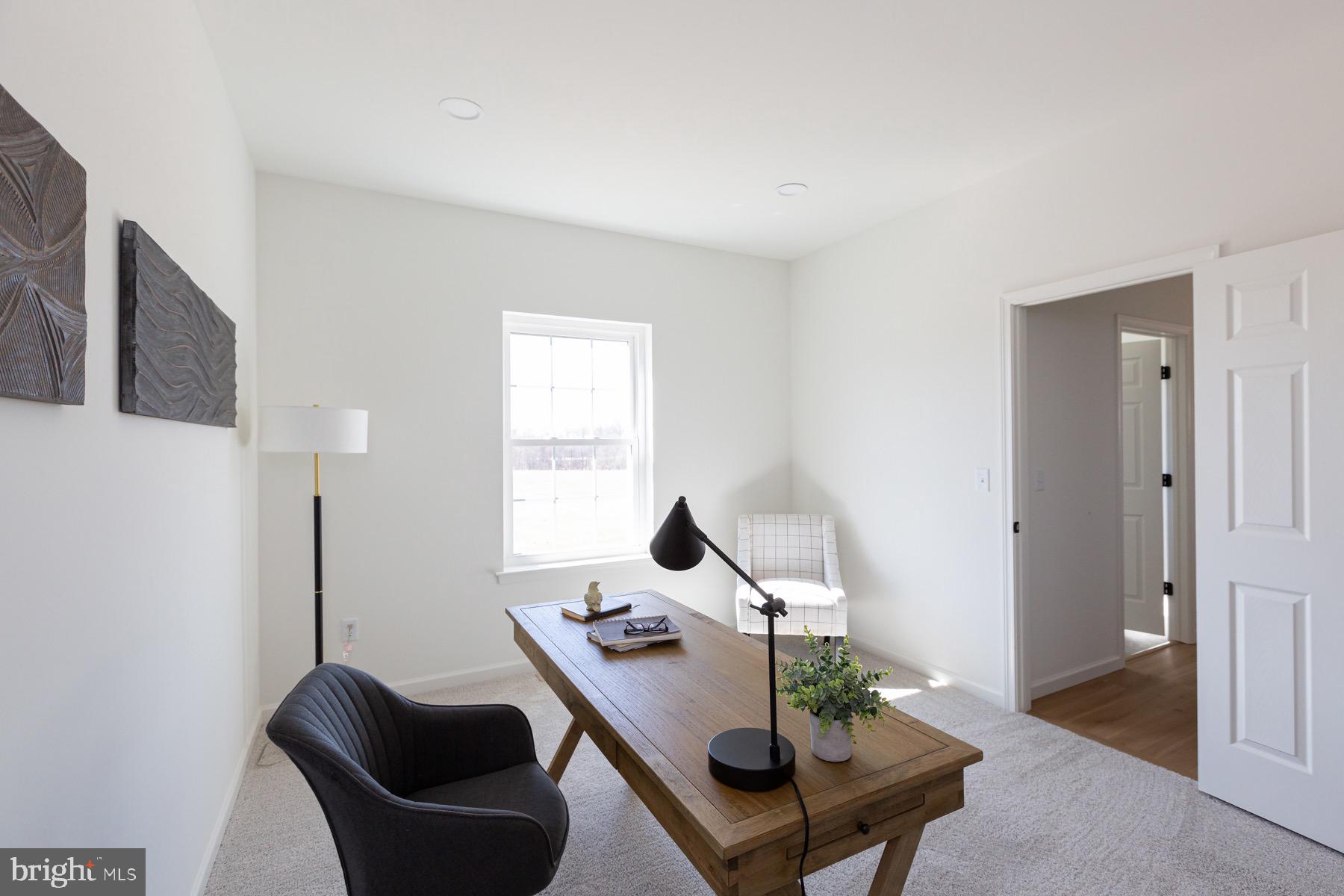 306 Wickmere Street, Unit 68 Oxford, PA 19363 - Photo 16 of 40 a living room with furniture and a window