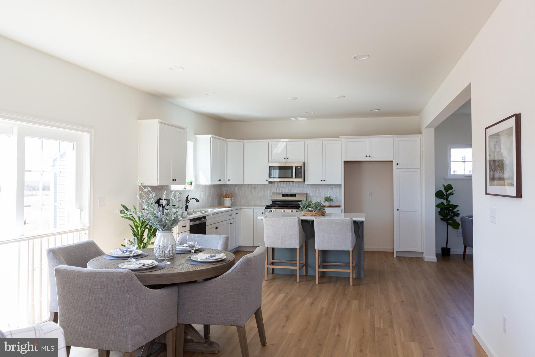 306 Wickmere Street, Unit 68 Oxford, PA 19363 - Photo 19 of 40 a dining room with furniture and window
