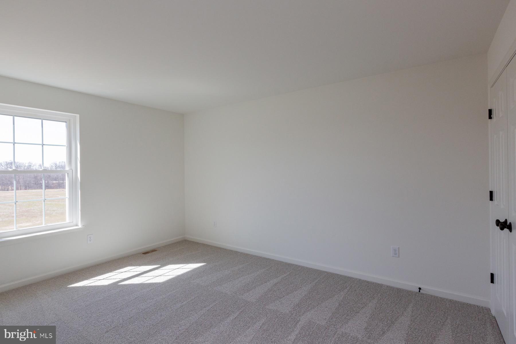 306 Wickmere Street, Unit 68 Oxford, PA 19363 - Photo 28 of 40 an empty room with a window