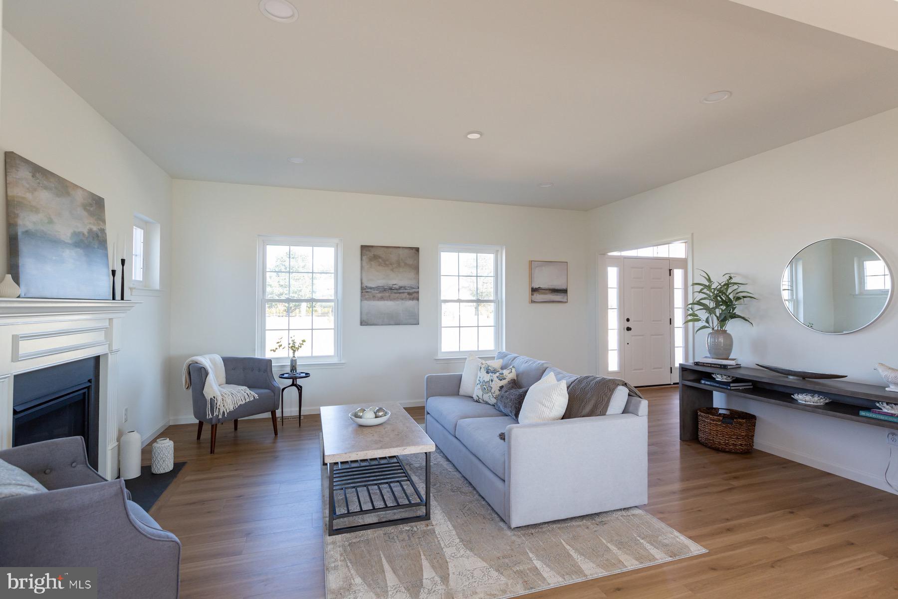 306 Wickmere Street, Unit 68 Oxford, PA 19363 - Photo 10 of 40 a living room with furniture or fireplace and a wooden floor