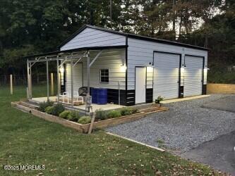 72 Main Street Holmdel, NJ 07733 - Photo 19 of 45 a view of a house with backyard and porch