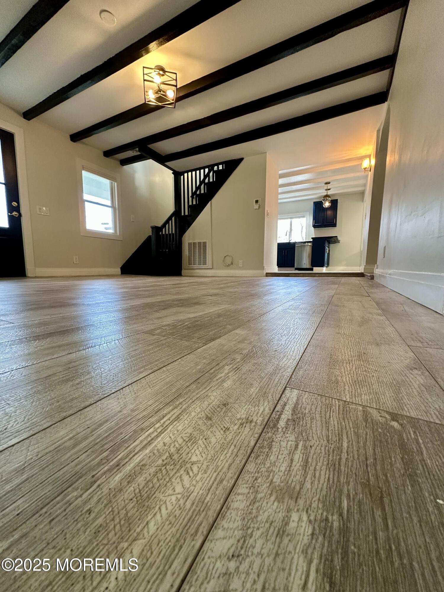 72 Main Street Holmdel, NJ 07733 - Photo 26 of 45 a view of empty room with wooden floor