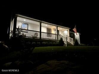 72 Main Street Holmdel, NJ 07733 - Photo 41 of 45 a porch with seating space