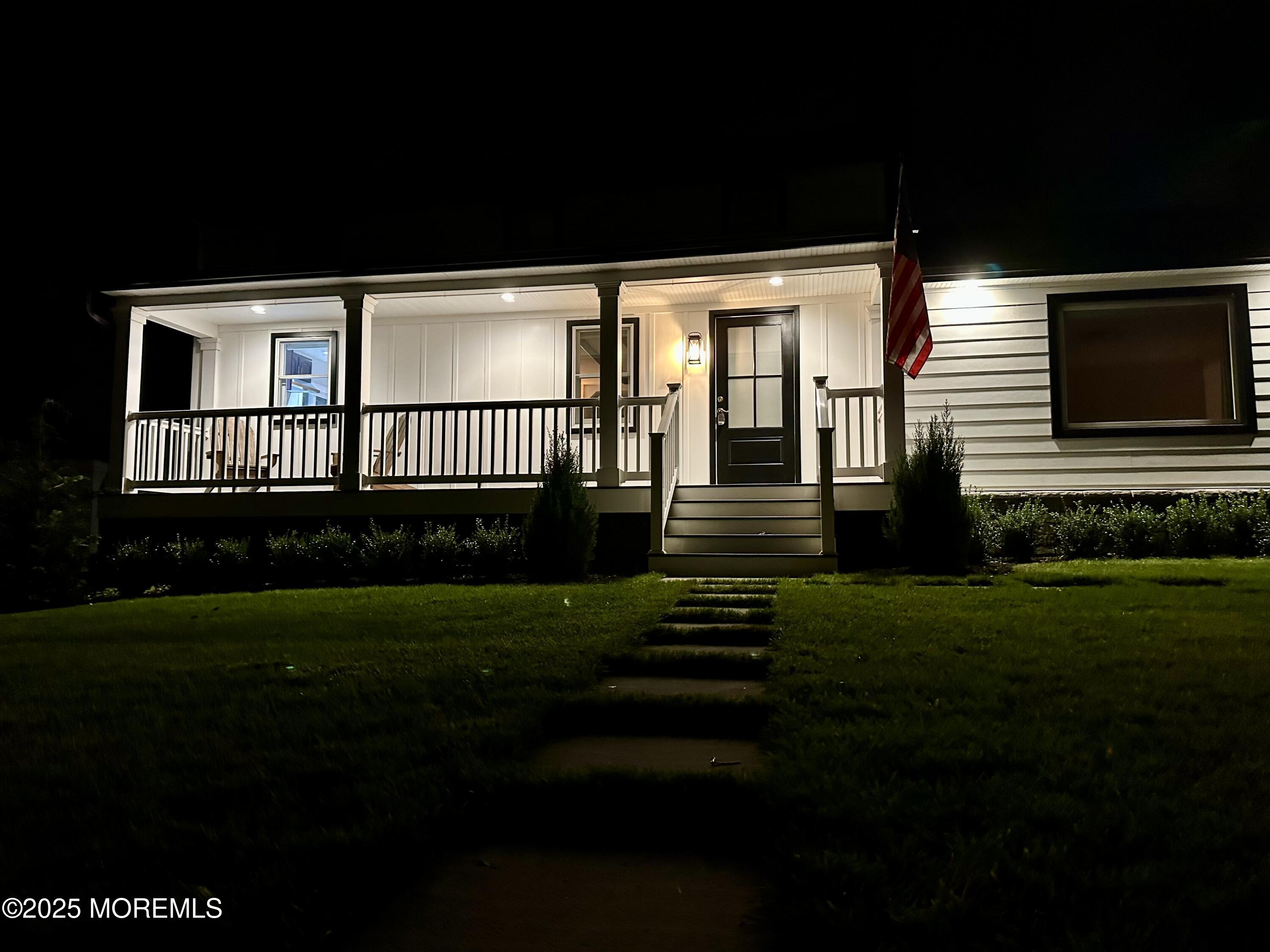 72 Main Street Holmdel, NJ 07733 - Photo 44 of 45 a front view of a house with a yard