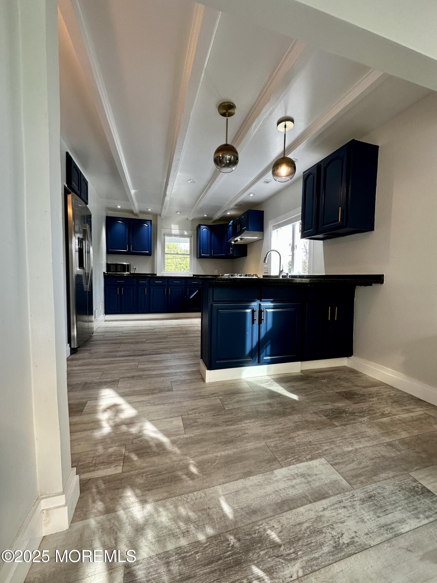 72 Main Street Holmdel, NJ 07733 - Photo 9 of 45 a view of kitchen with stainless steel appliances granite countertop lots of counter top space