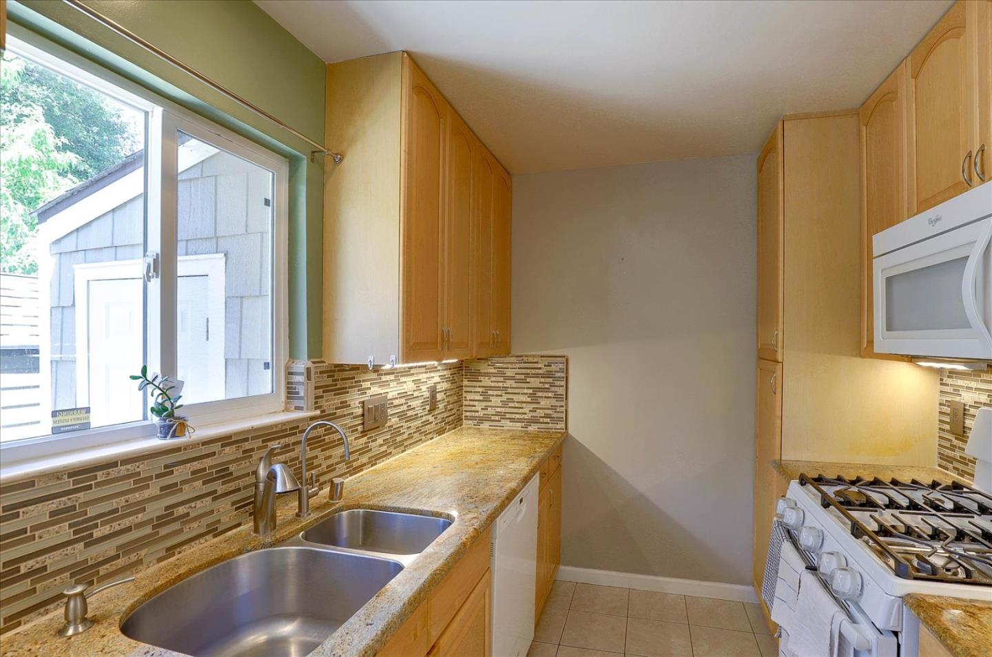 18204 Hale Avenue, Unit F, Hill, CA 95037 Compass