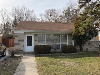 17636 Dixie Highway Homewood, IL 60430 - Photo 1 of 1 a front view of a house with a garden