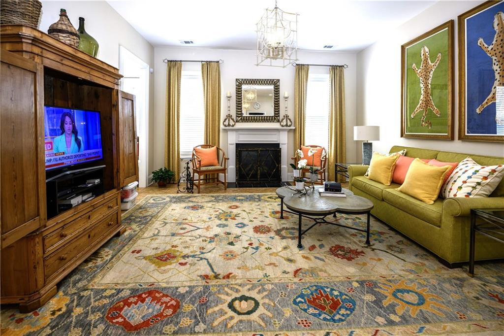 902 Quail Ridge Lane Perry, GA 31069 - Photo 14 of 25 a living room with furniture and a flat screen tv