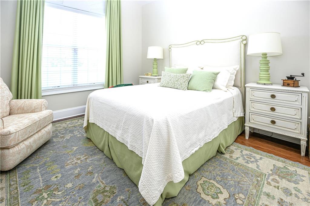 902 Quail Ridge Lane Perry, GA 31069 - Photo 18 of 25 a bedroom with a bed and a window