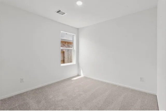 a bathroom with a sink toilet and a mirror
