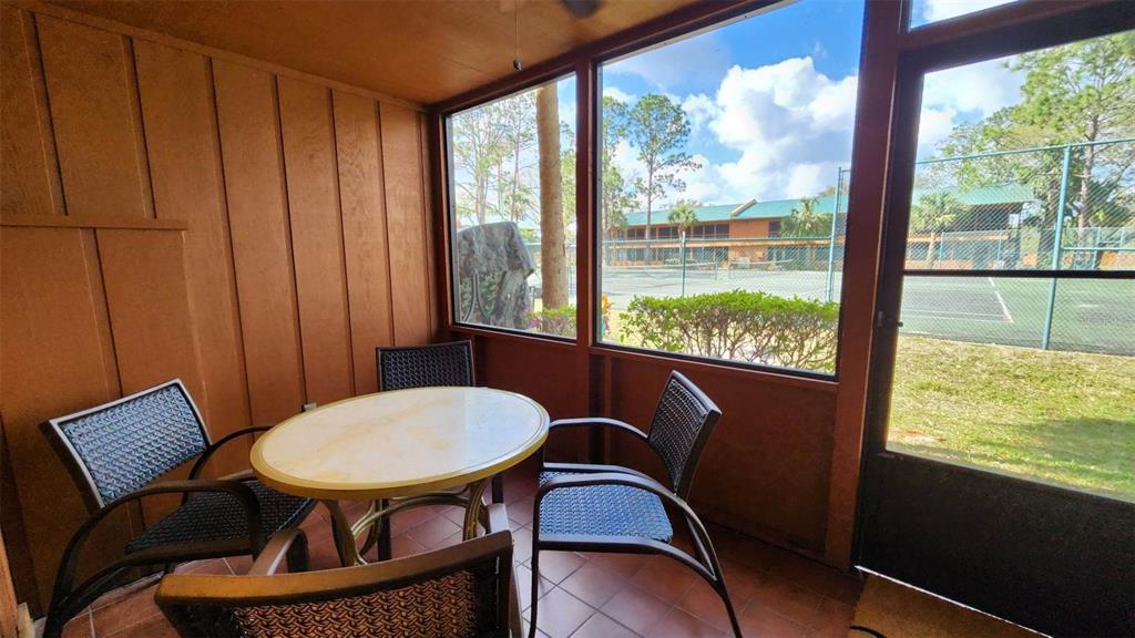 3200 River Ranch Boulevard, Unit 151 River Ranch, FL 33867 - Photo 13 of 28 a view of a chairs and table in patio