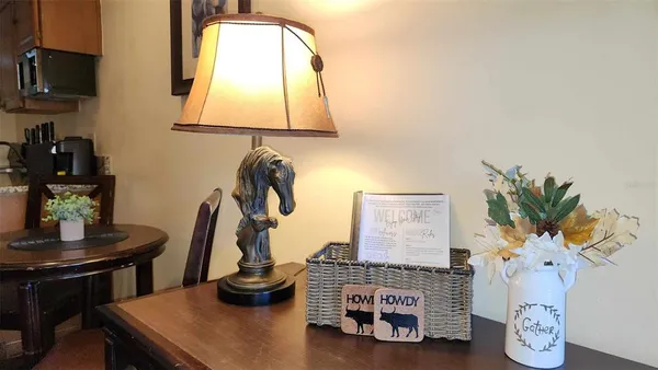 a room with furniture and a mirror