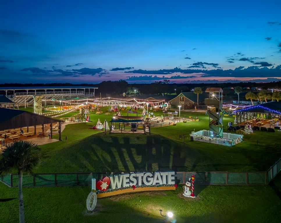3200 River Ranch Boulevard, Unit 151 River Ranch, FL 33867 - Photo 21 of 28 a view of a swimming pool and outdoor seating