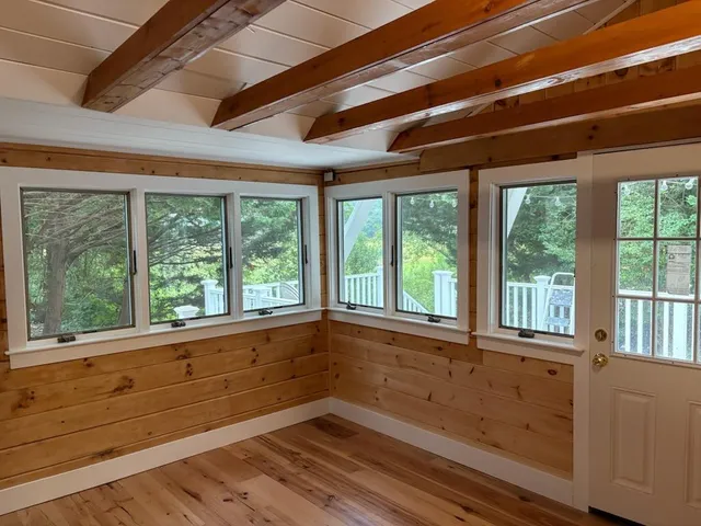 a view of a room with a large window