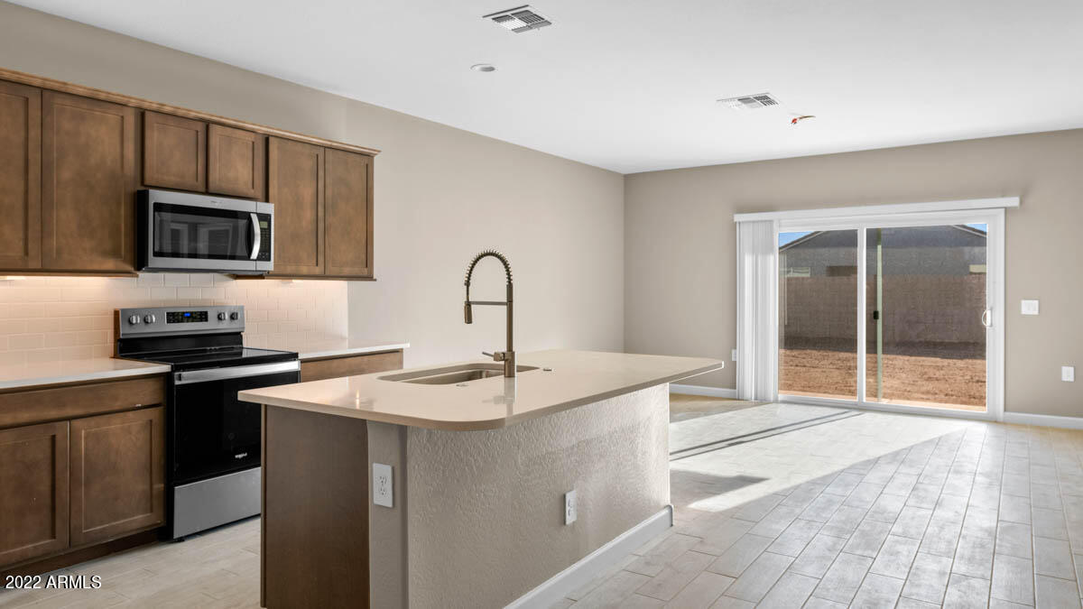 24061 West Ripple Road Buckeye, AZ 85326 - Photo 7 of 31 Harris H35H Desert Moon Buckeye AZ DRHor