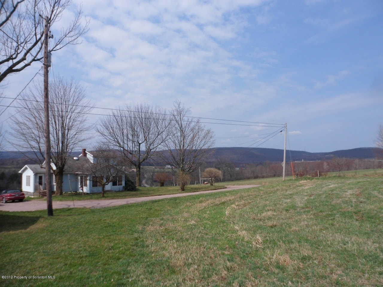 437 North Baker Road Waymart, PA 18472 - Photo 12 of 22 a big yard with lots of green space and trees