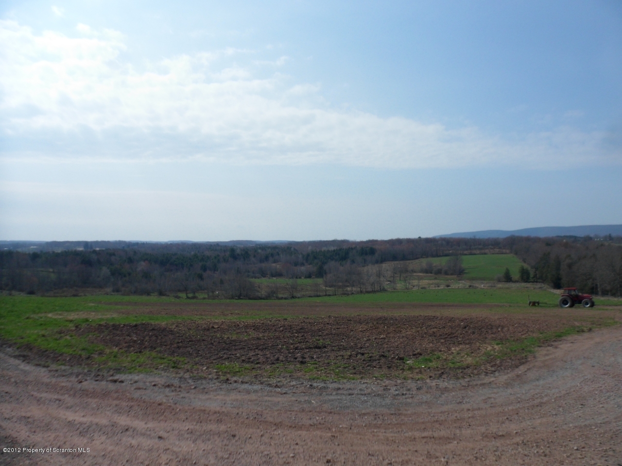 437 North Baker Road Waymart, PA 18472 - Photo 17 of 22 a view of a field with trees in background