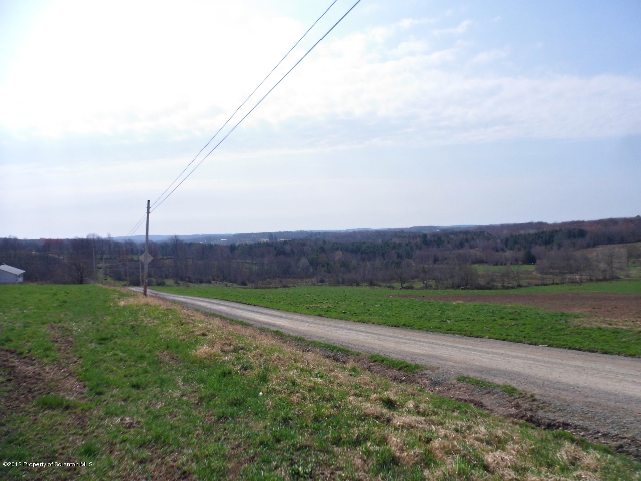 437 North Baker Road Waymart, PA 18472 - Photo 18 of 22 a view of a grassy field with an ocean