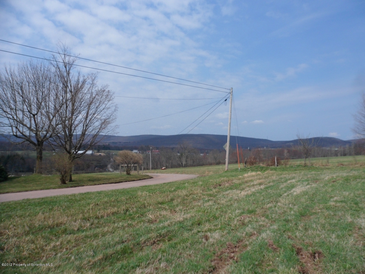 437 North Baker Road Waymart, PA 18472 - Photo 19 of 22 a backyard of a house with lots of green space
