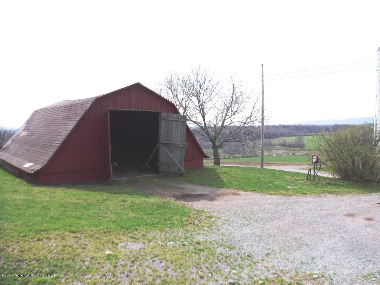 437 North Baker Road Waymart, PA 18472 - Photo 3 of 22 a backyard of a house with lots of green space