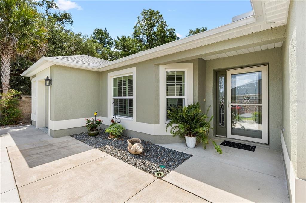 7351 Southeast 169th Cote Loop The Villages, FL 32162 - Photo 3 of 32 a front view of a house