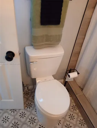 a close view of a toilet in a bathroom