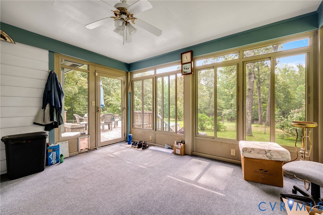 17707 Loving Union Road Disputanta, VA 23842 - Photo 31 of 42 Sunroom featuring extensive window panels, dual gl