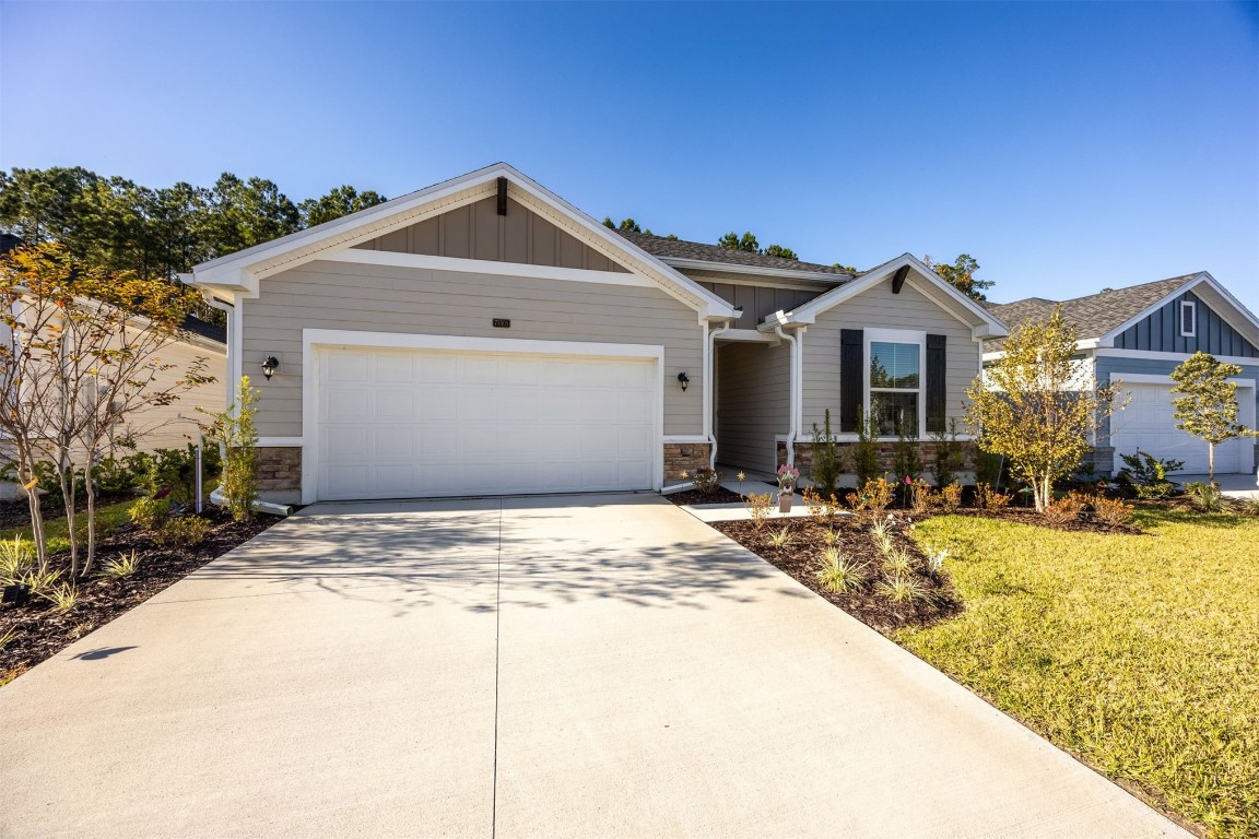 75505 Banyan Way Yulee, FL 32097 - Photo 1 of 94 a front view of a house with yard