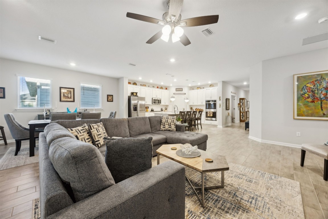 75505 Banyan Way Yulee, FL 32097 - Photo 11 of 94 a living room with furniture and a view of kitchen