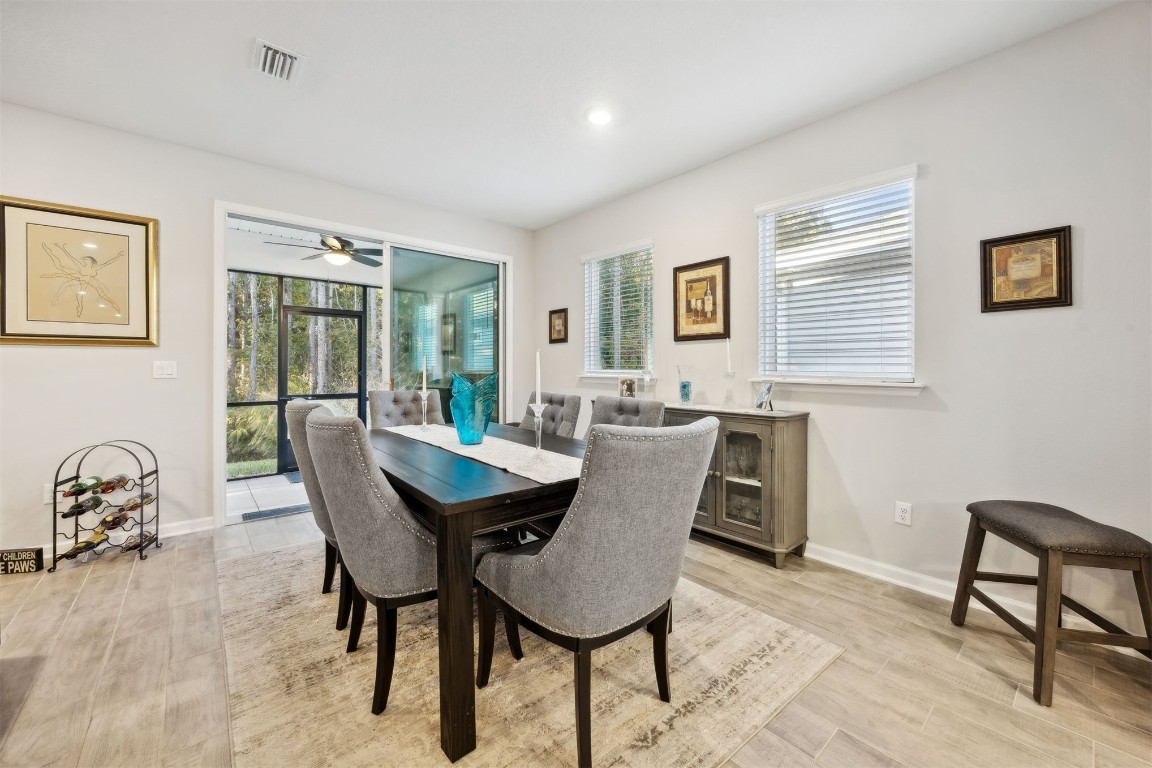 75505 Banyan Way Yulee, FL 32097 - Photo 19 of 94 a view of a dining room with furniture and a window