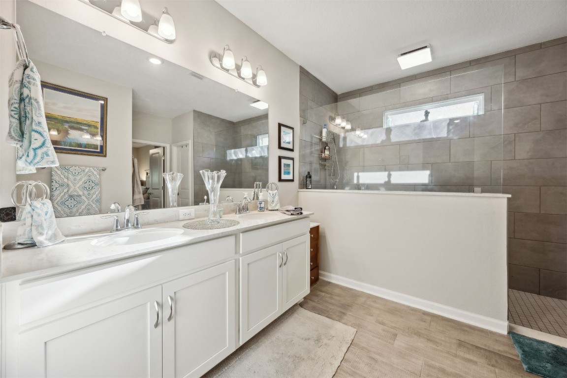 75505 Banyan Way Yulee, FL 32097 - Photo 28 of 94 a bathroom with a sink and a mirror