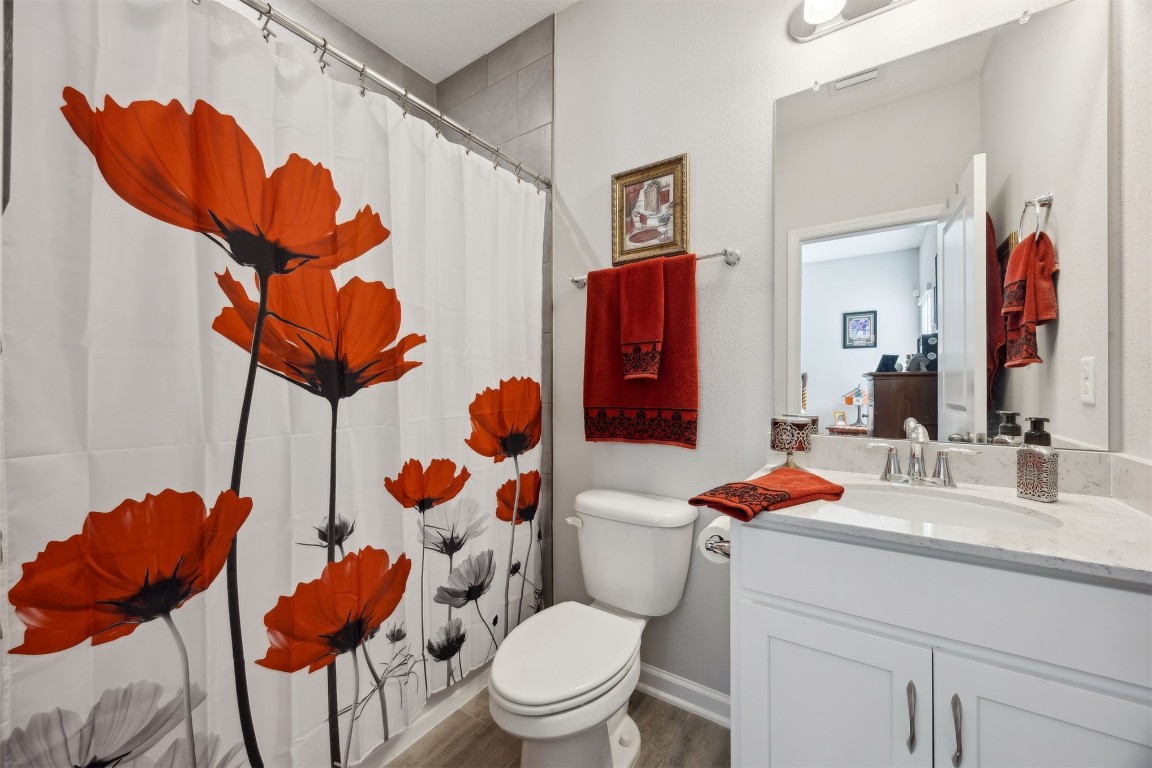 75505 Banyan Way Yulee, FL 32097 - Photo 42 of 94 a bathroom with a sink toilet and mirror