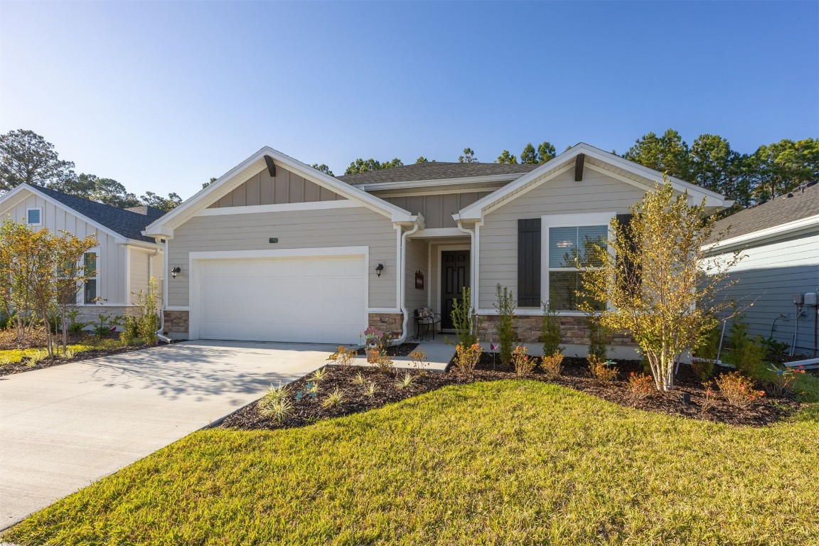 75505 Banyan Way Yulee, FL 32097 - Photo 52 of 94 a front view of a house with a yard