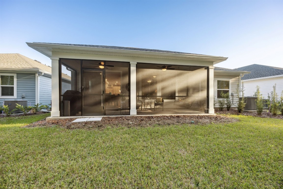 75505 Banyan Way Yulee, FL 32097 - Photo 53 of 94 front view of a house with a yard