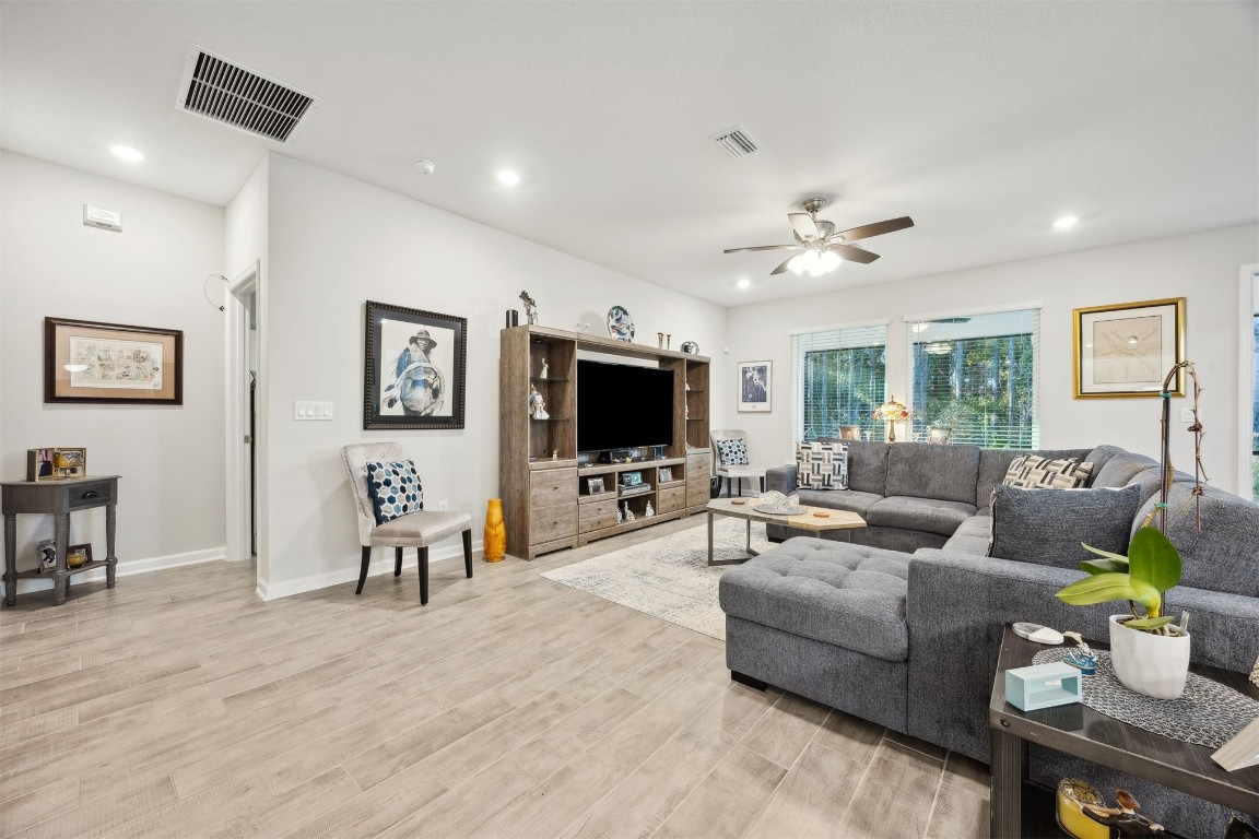 75505 Banyan Way Yulee, FL 32097 - Photo 7 of 94 a living room with furniture and a flat screen tv