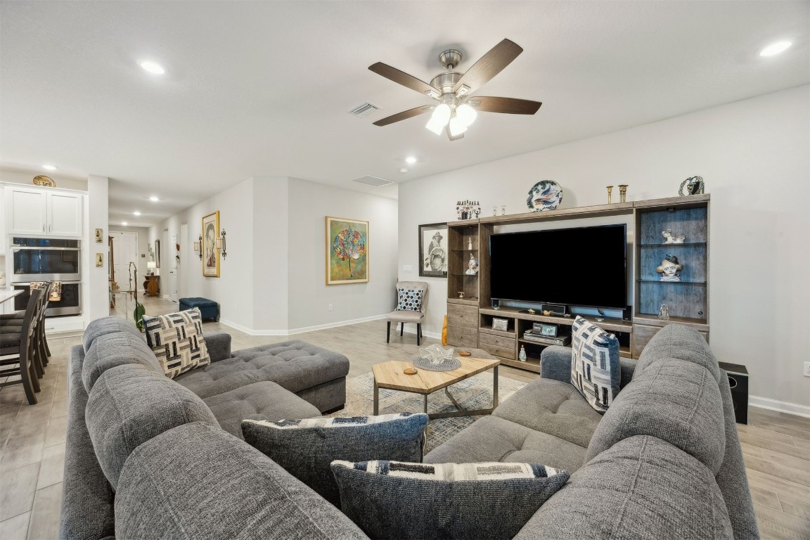 75505 Banyan Way Yulee, FL 32097 - Photo 10 of 94 a living room with furniture and a flat screen tv