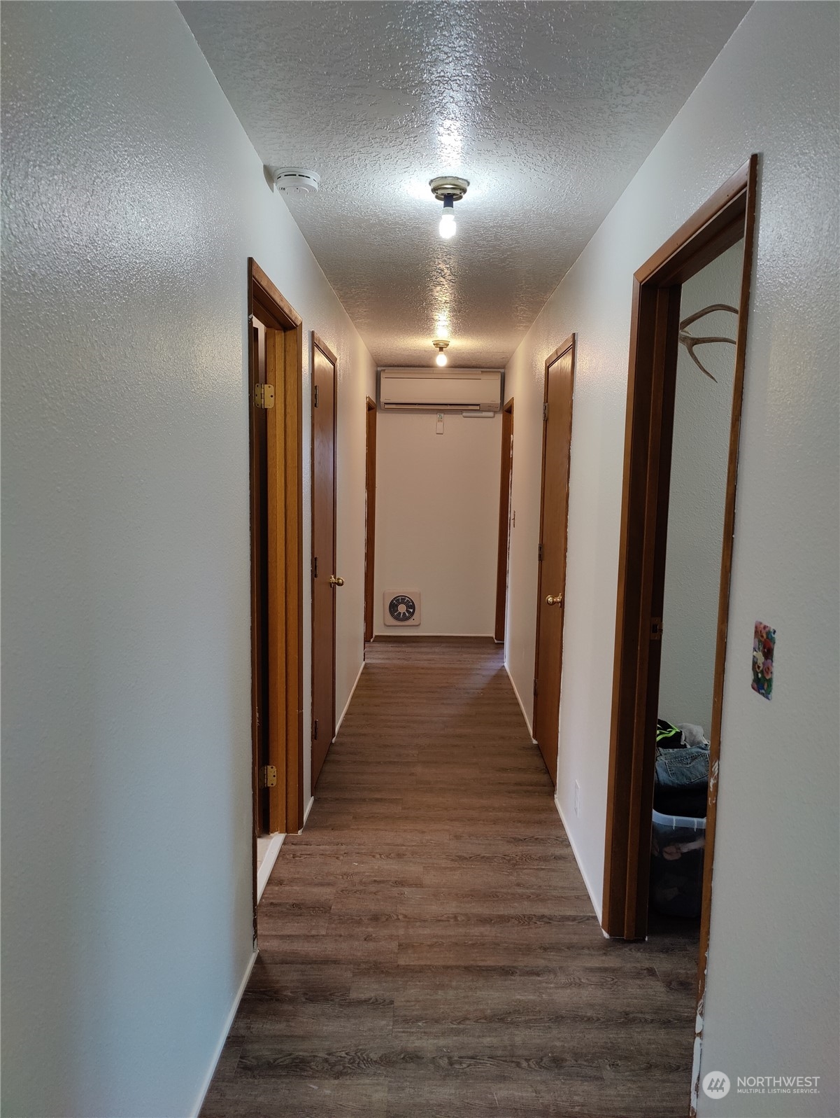 126 Reinseth Road Winlock, WA 98596 - Photo 17 of 33 a view of hallway with wooden floor
