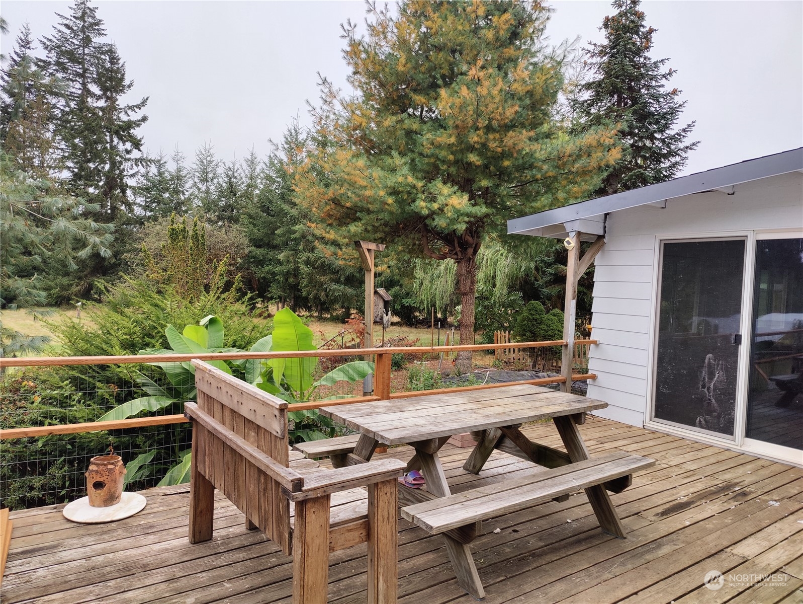 126 Reinseth Road Winlock, WA 98596 - Photo 26 of 33 a view of sitting area with furniture and wooden deck