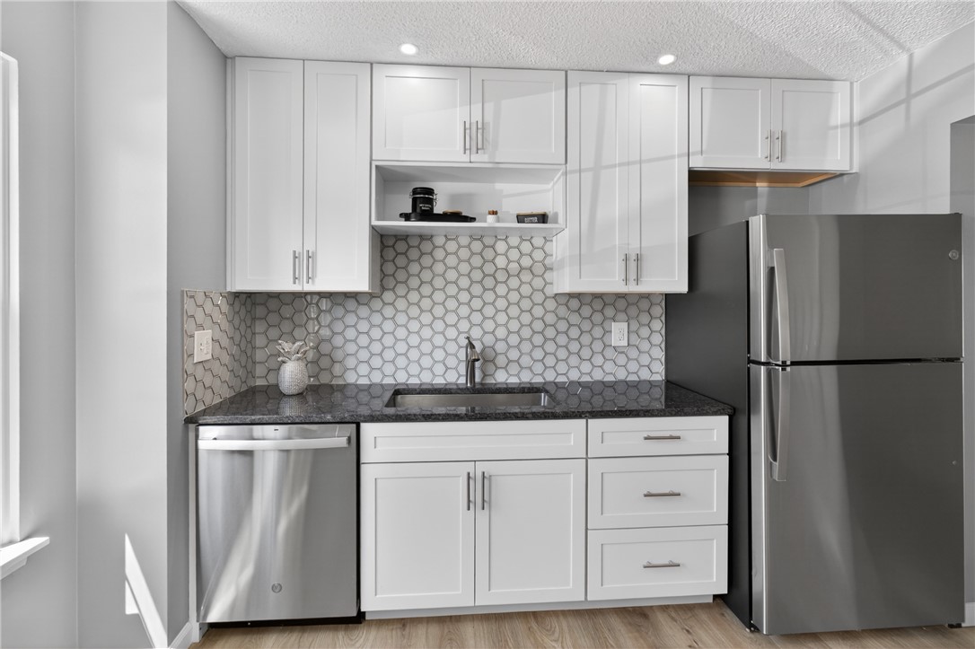 561 French Road Brighton, NY 14618 - Photo 6 of 45 RECESSED LIGHTING * DEEP UNDERMOUNT SINK W/ DISPOS