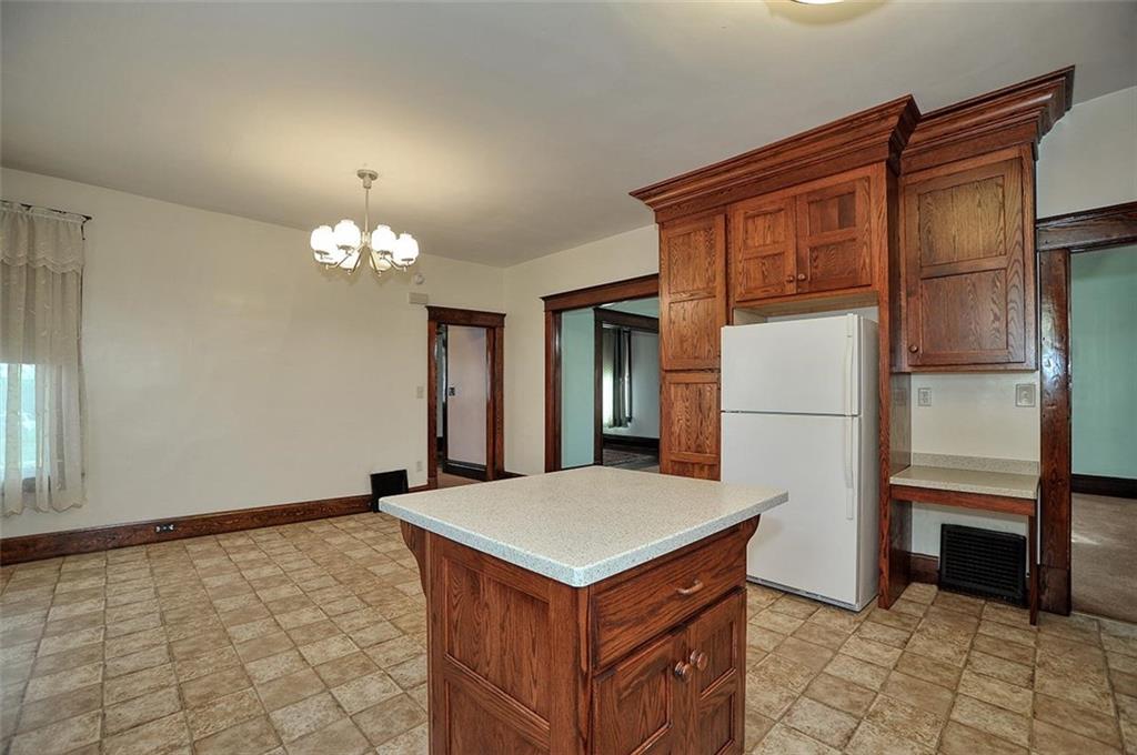 25 Wabash Avenue Hickory, PA 15340 - Photo 12 of 29 a kitchen that has a fridge and a table in it