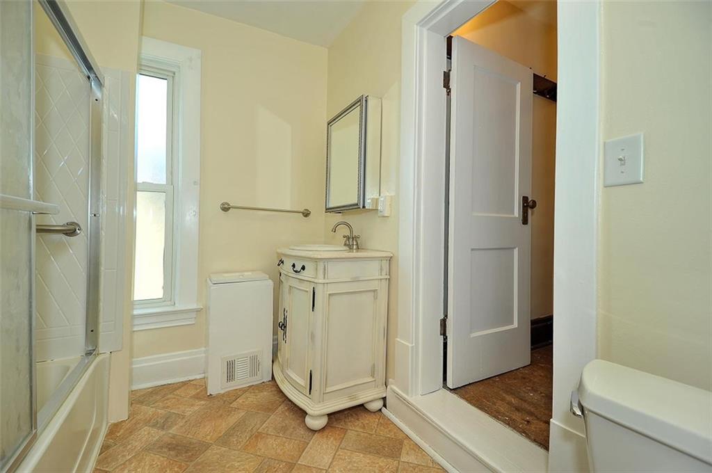 25 Wabash Avenue Hickory, PA 15340 - Photo 15 of 29 a bathroom with a granite countertop sink and a mirror