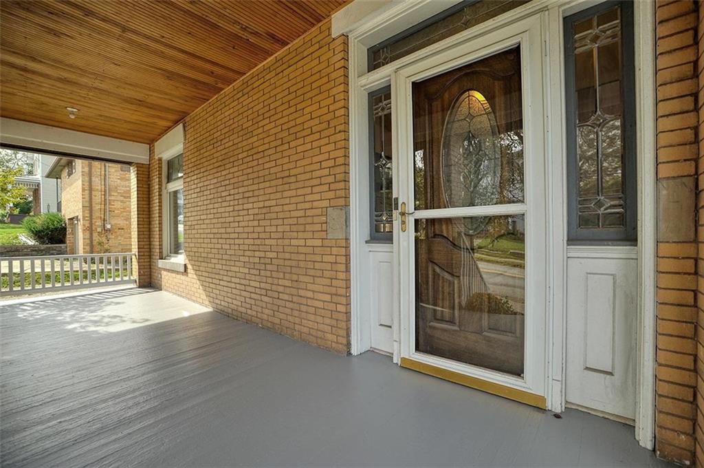 25 Wabash Avenue Hickory, PA 15340 - Photo 4 of 29 a view of a porch with a door