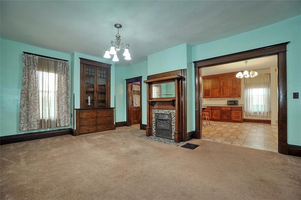 25 Wabash Avenue Hickory, PA 15340 - Photo 9 of 29 an empty room with chandelier fan and windows