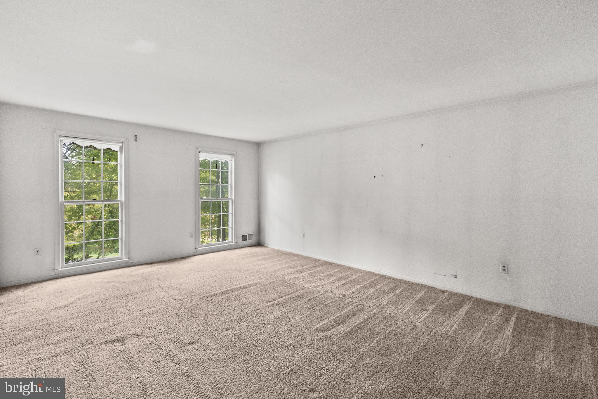 9509 Emory Grove Road Gaithersburg, MD 20877 - Photo 13 of 57 a view of an empty room with a window