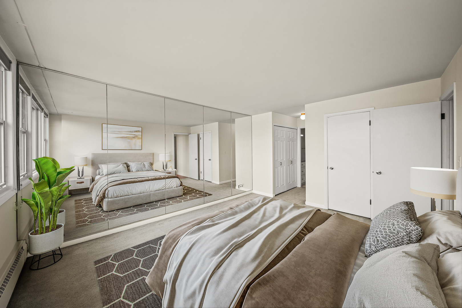 5975 North Odell Avenue, Unit 5C Chicago, IL 60631 - Photo 11 of 20 a bedroom with a bed and a couch