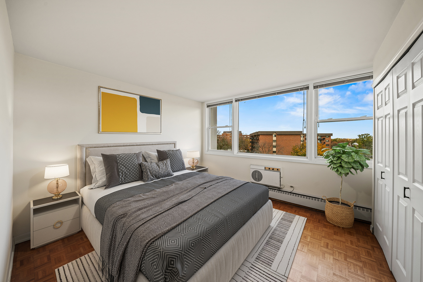 5975 North Odell Avenue, Unit 5C Chicago, IL 60631 - Photo 14 of 20 a bedroom with a bed and a potted plant