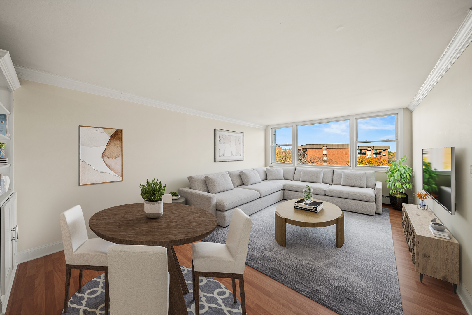 5975 North Odell Avenue, Unit 5C Chicago, IL 60631 - Photo 2 of 20 a living room with furniture and a flat screen tv